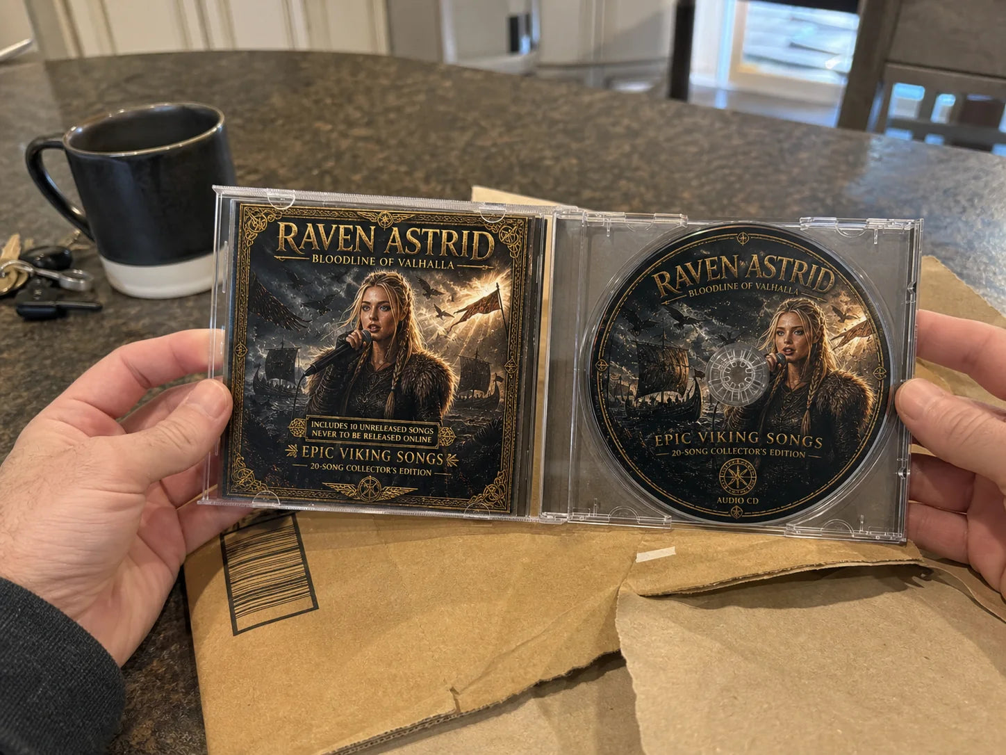 Raven Astrid collector CD being opened at home